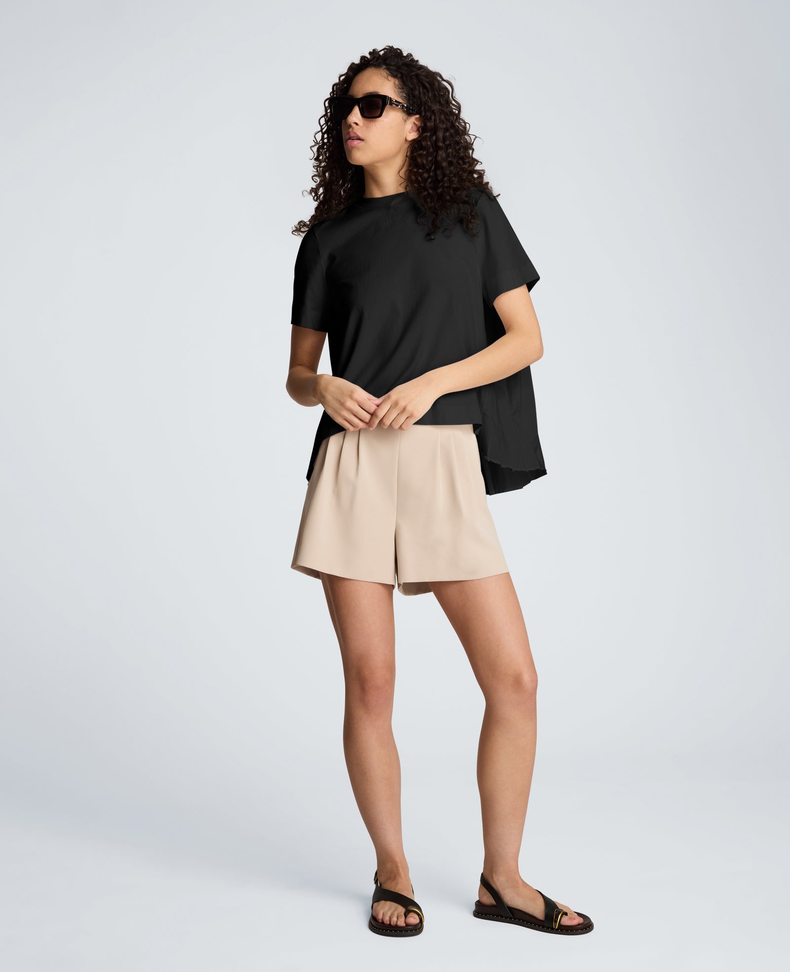 Short Sleeve Crewneck Tee with Pleated Asymmetrical Hem