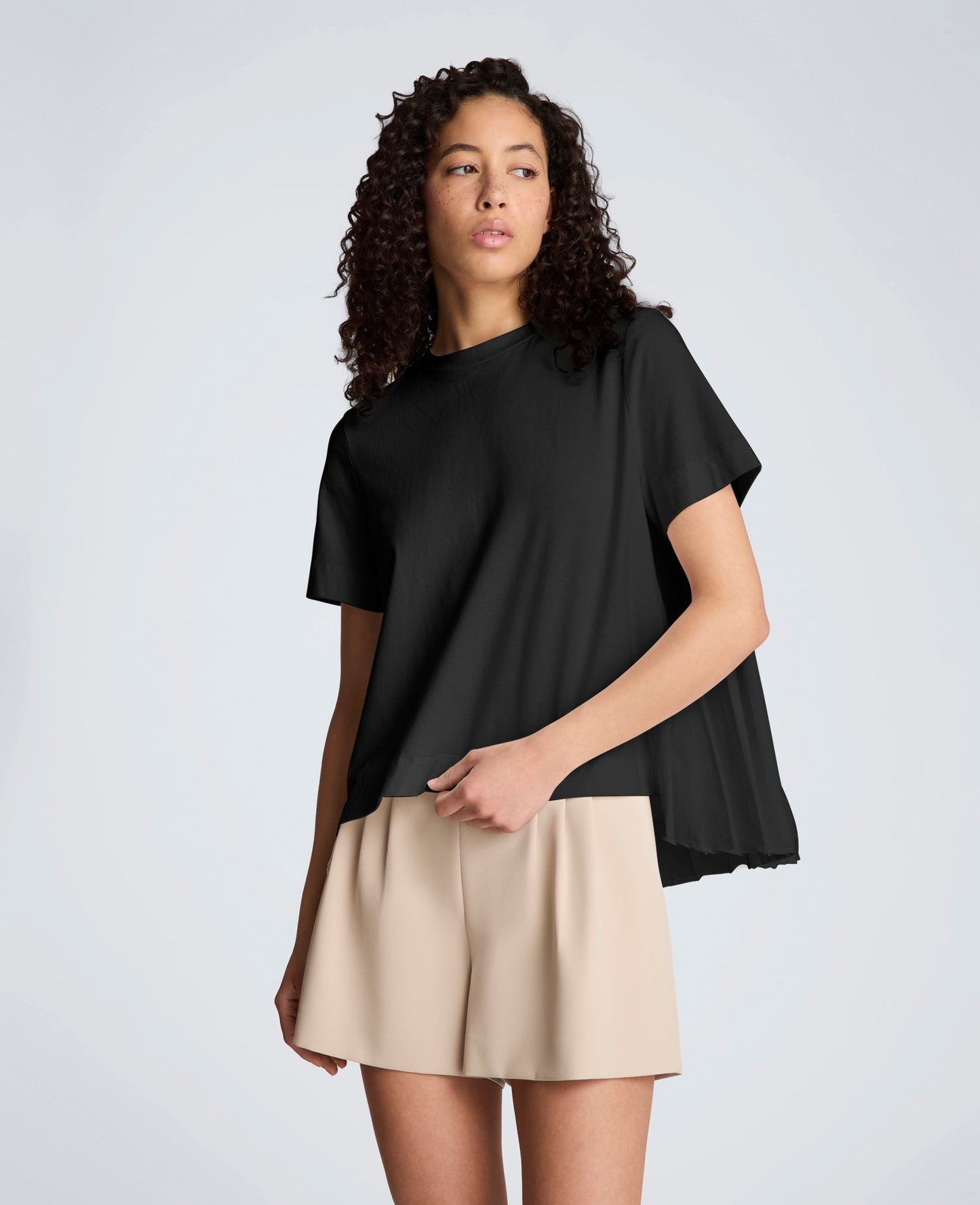 Short Sleeve Crewneck Tee with Pleated Asymmetrical Hem