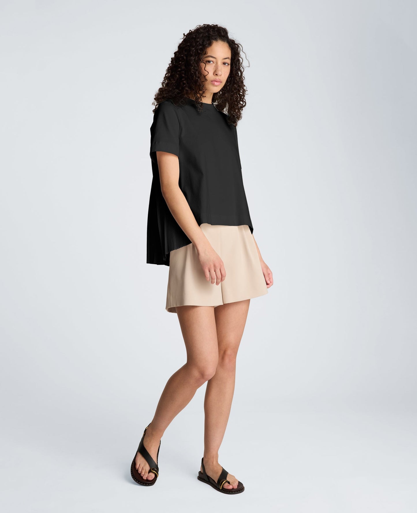 Short Sleeve Crewneck Tee with Pleated Asymmetrical Hem